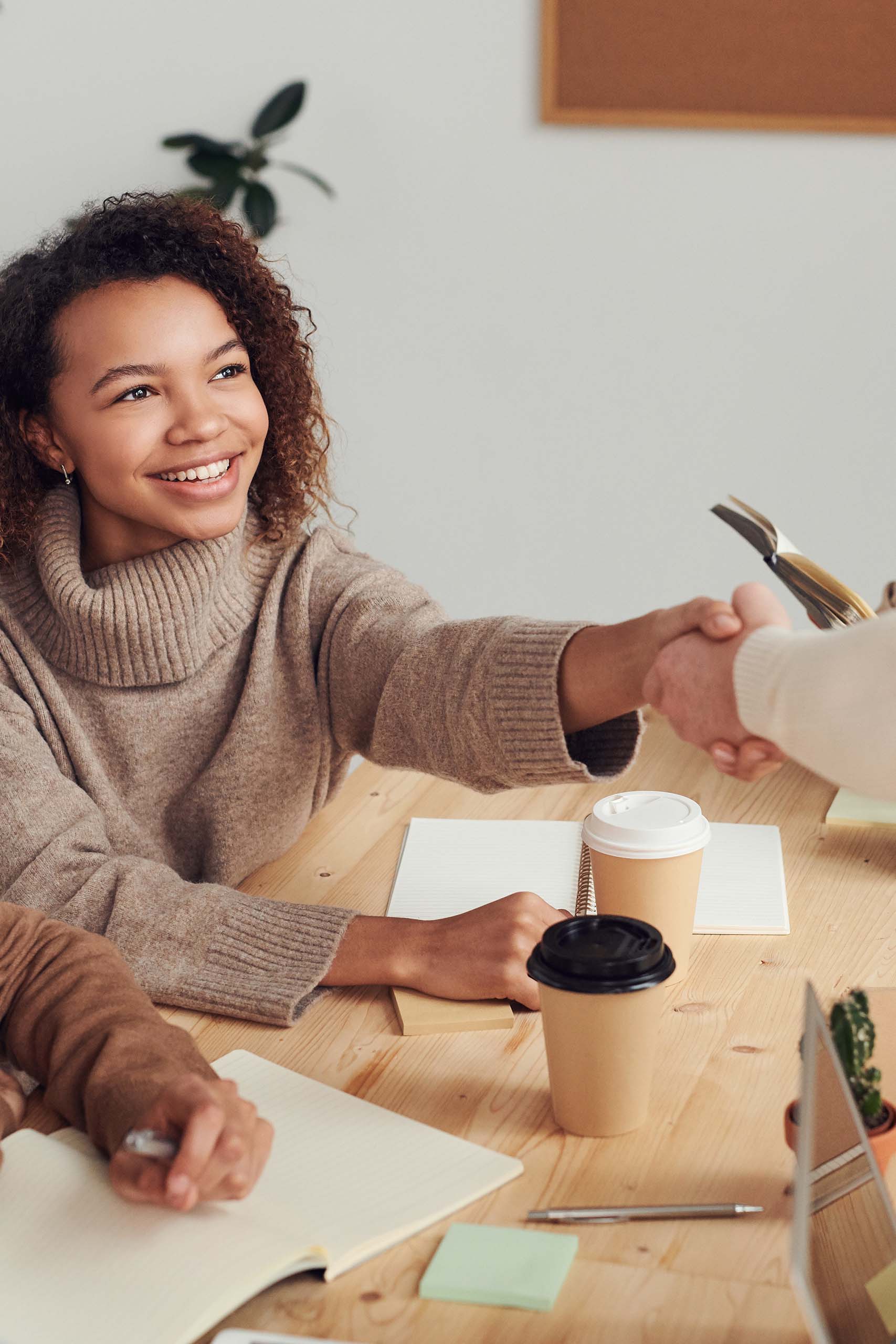 Property owner shaking hands with a manager